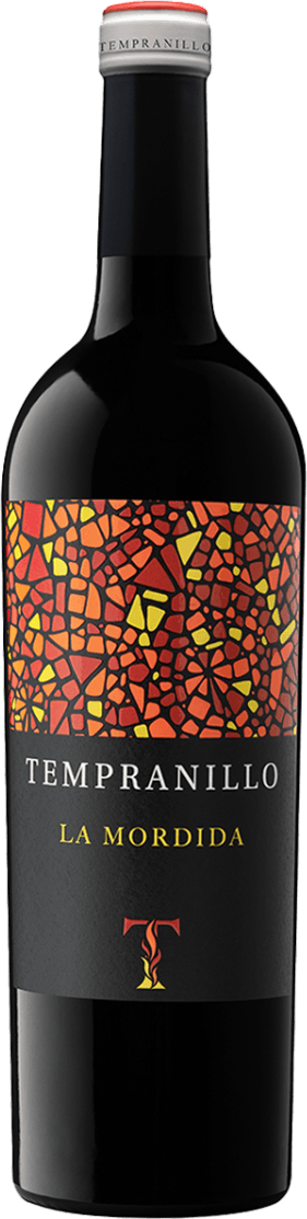 Het label heeft een mozaïekpatroon van kleurrijke, onregelmatige vormen in rood, oranje en geel. Daaronder staat de tekst 'TEMPRANILLO' in witte letters en 'LA MORDIDA' in gele letters op een zwarte achtergrond.