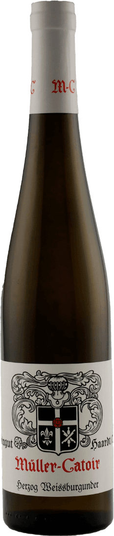 Het label toont een familiewapen met sierlijke krullen en symbolen. De naam 'Müller-Catoir' is prominent in rood weergegeven onder het wapen, en er zijn decoratieve elementen rondom het schild.