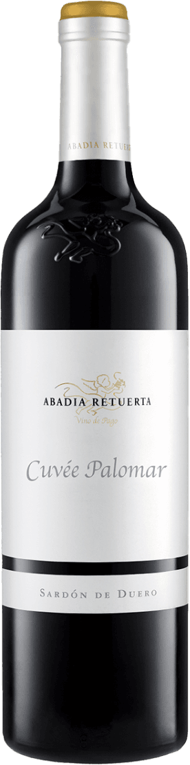 Het label is wit met daarop de tekst 'Abadia Retuerta' en 'Cuvée Palomar'. Er is een subtiele afbeelding van een gestileerde vogel in goudkleur boven de tekst. De stijl is minimalistisch en elegant.